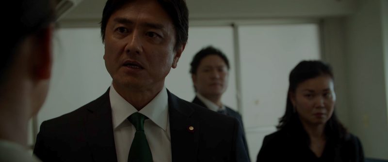 取調べに応じる衆議院議員・塚本明